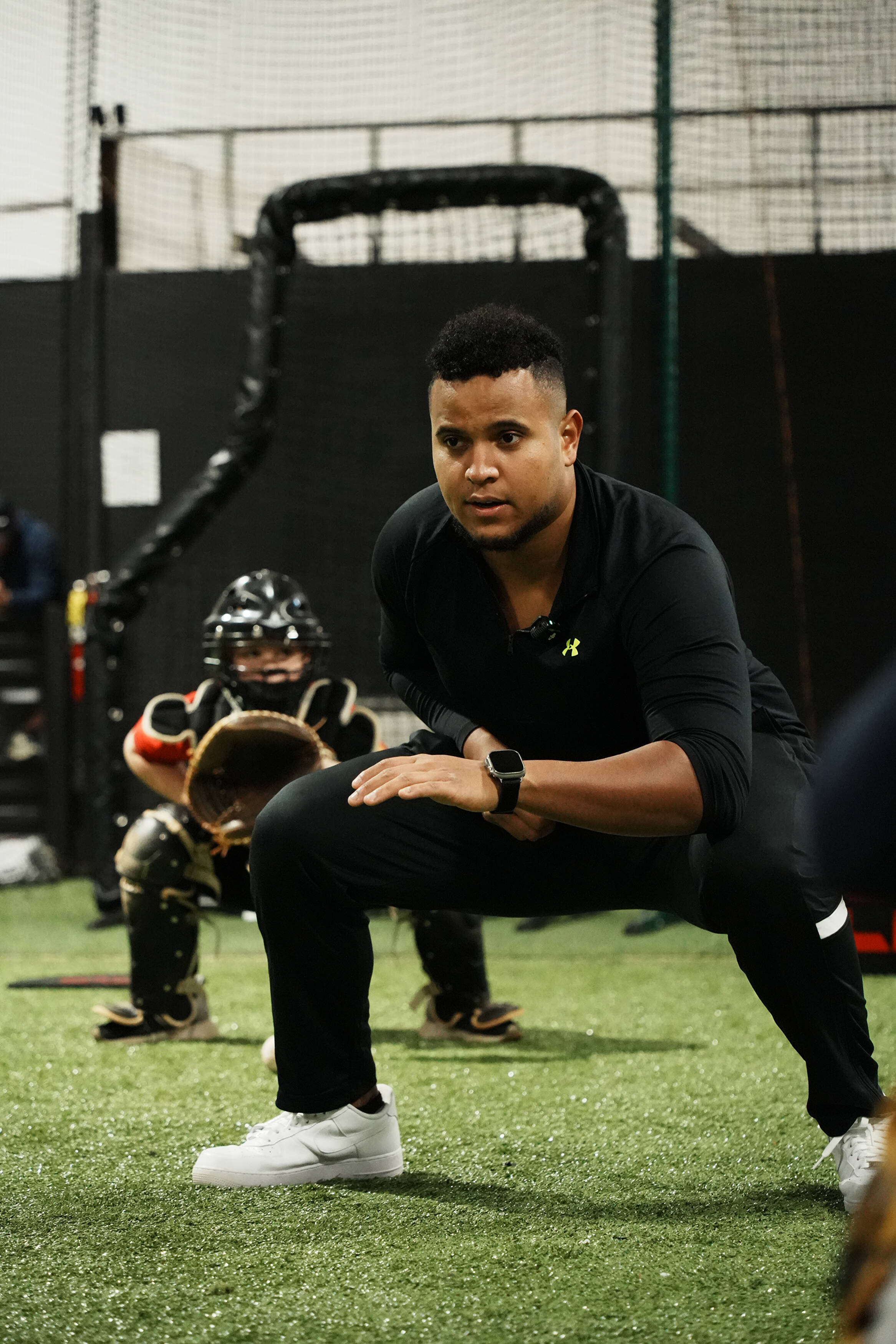 Andrés Ugarte demonstrating catcher movement during training