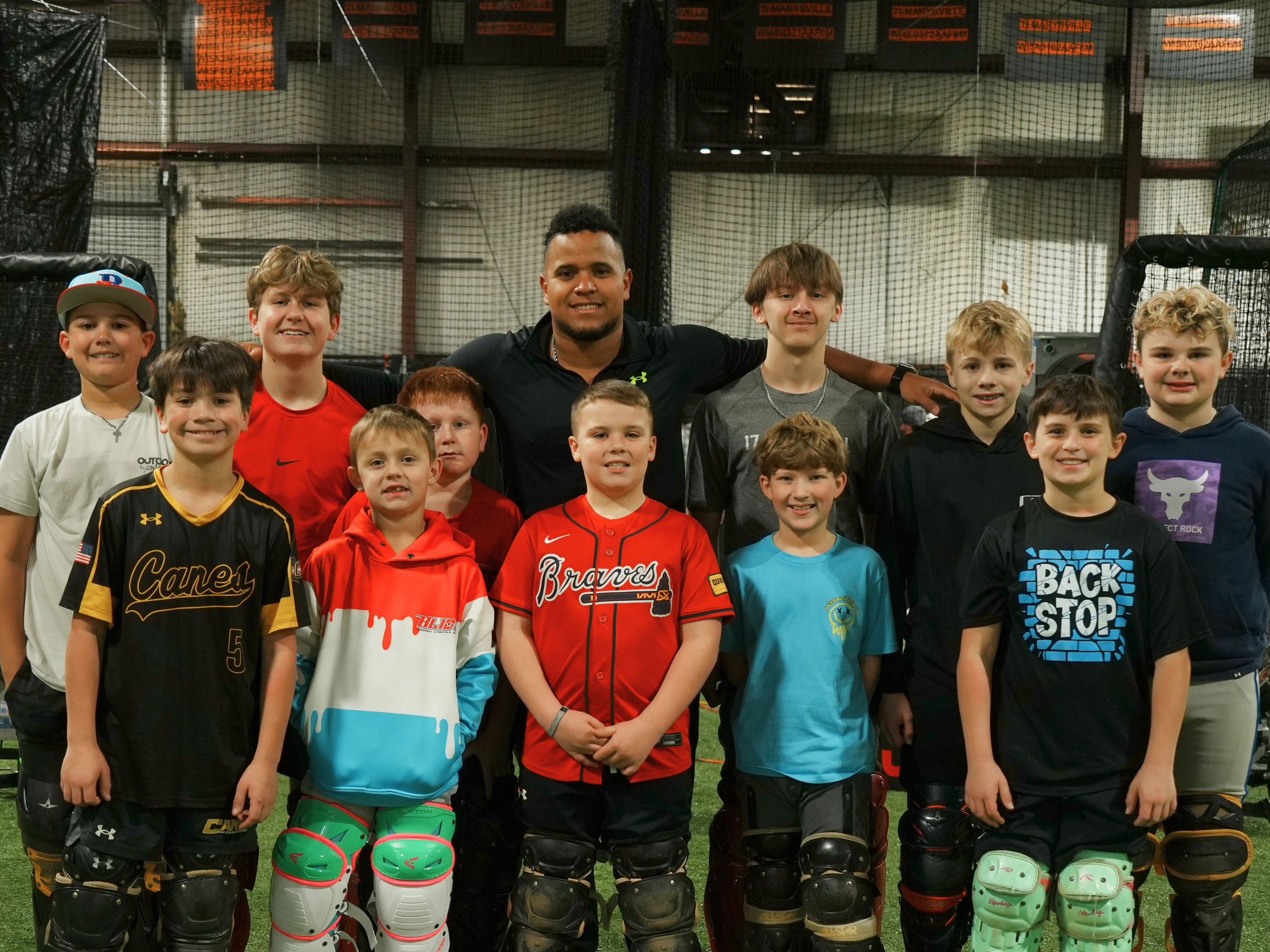 Catchers training together inside the CATCHPRO ACADEMY facility