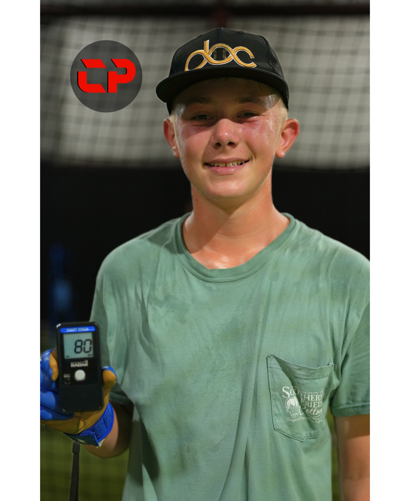 Athlete holding a radar device displaying an 80 mile-per-hour reading