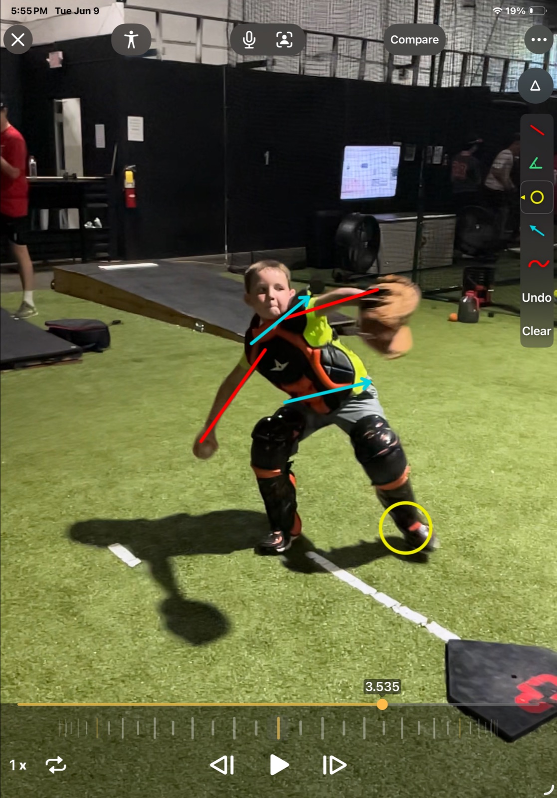 Youth catcher throwing analysis with body-direction lines, arrows, and a highlighted foot position